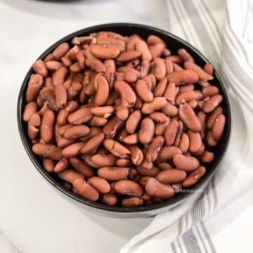 A bowl of Instant pot Kidney beans are on the table.