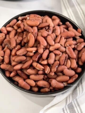 A bowl of Instant pot Kidney beans are on the table.