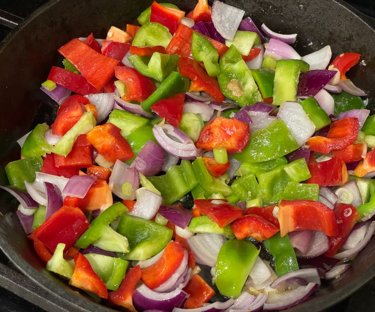 A skillet is with vegetables for stir fry recipe.