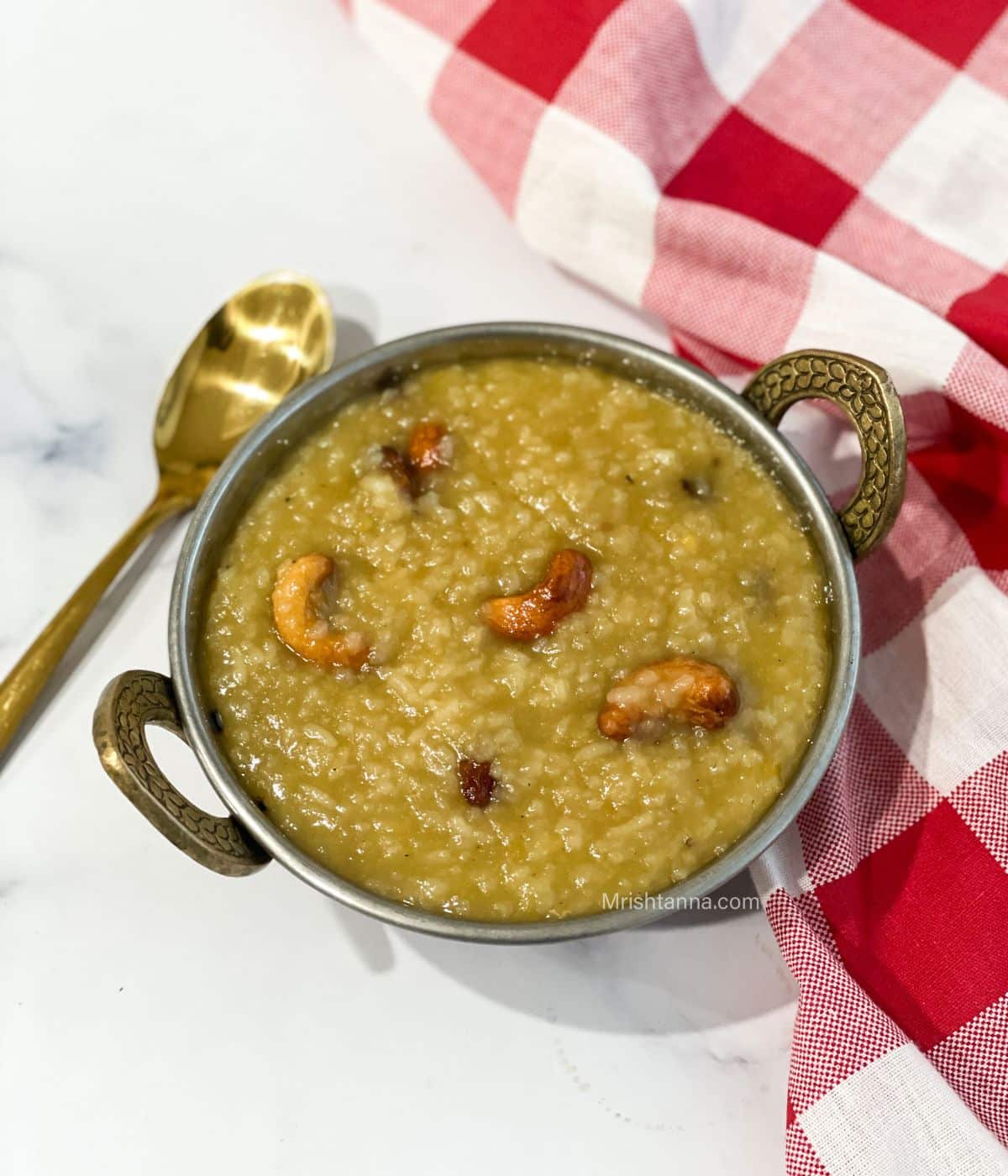 A copper bowl is filled with vegan sweet ponagl.