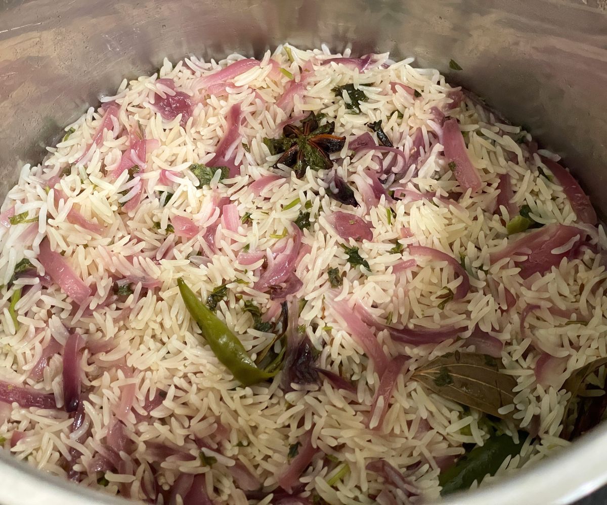 An instant pot has bagara rice.