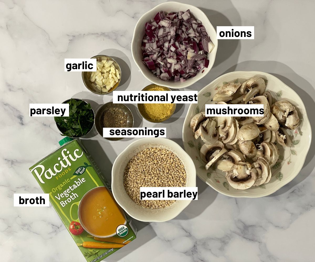 Barley risotto ingredients are on the table.