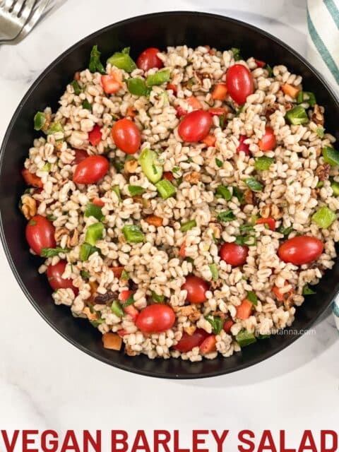 Vegan barley salad is on the plate.