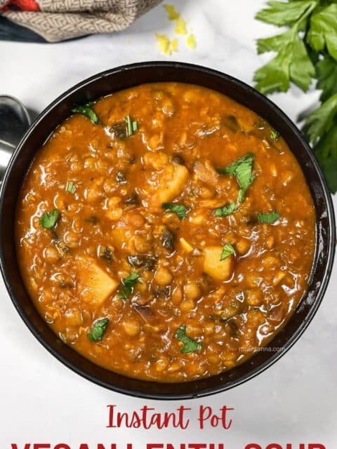 A bowl of vegan lentil soup is on the table.