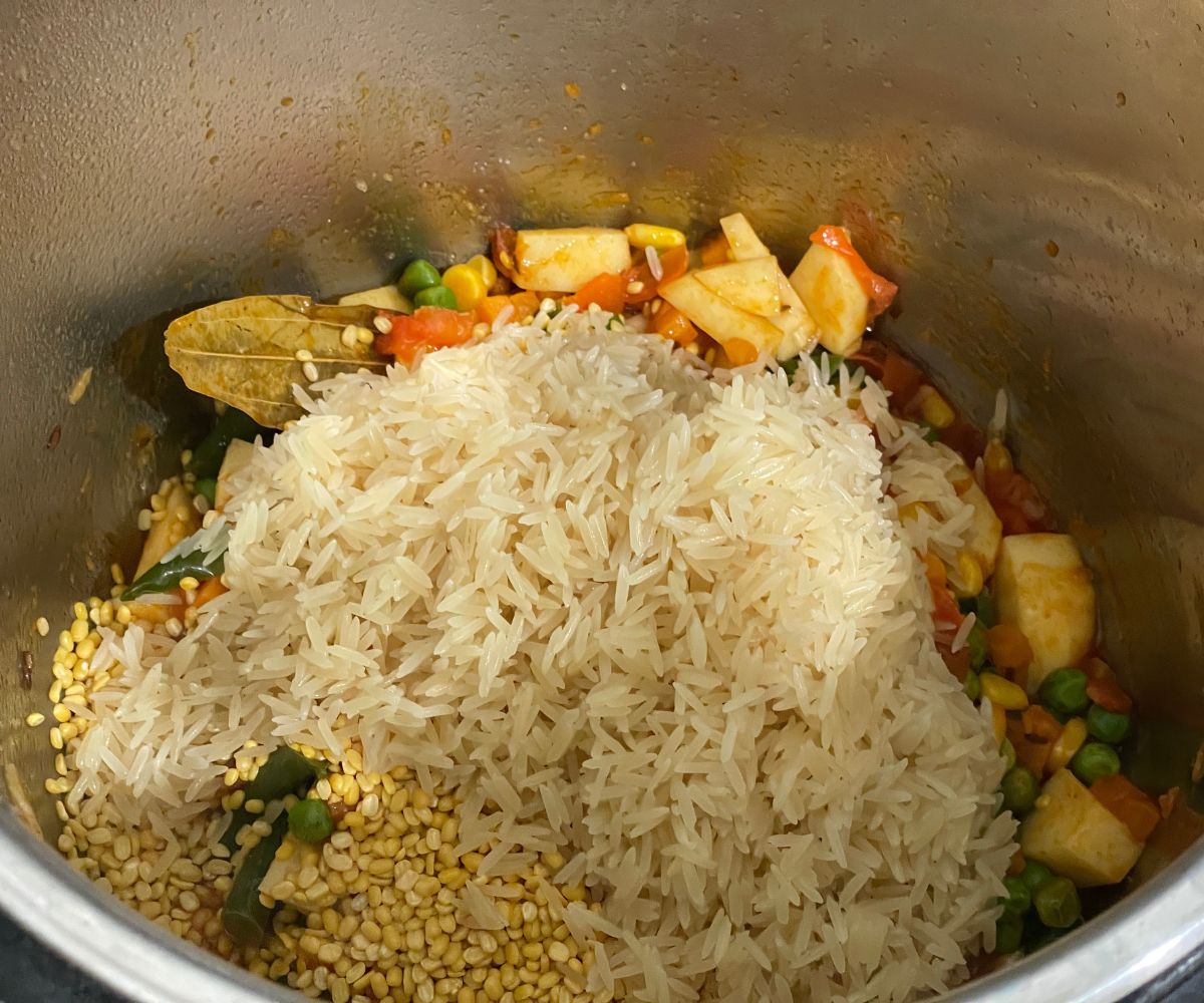 A pot is full of bengali khichdi mixture.