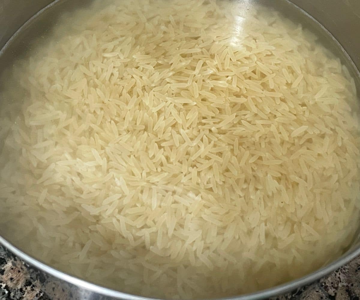 A bowl basmati rice and water.