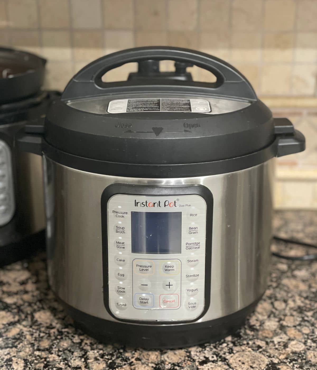 Instant Pot Pressure cooker is on the counter top.