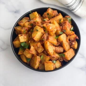 A bowl of Indian Kohlrabi recipes is on the surface.