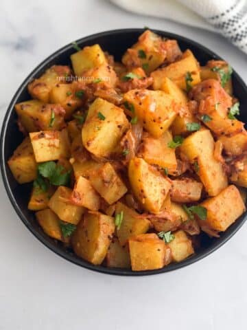 A bowl of Indian Kohlrabi recipes is on the surface.