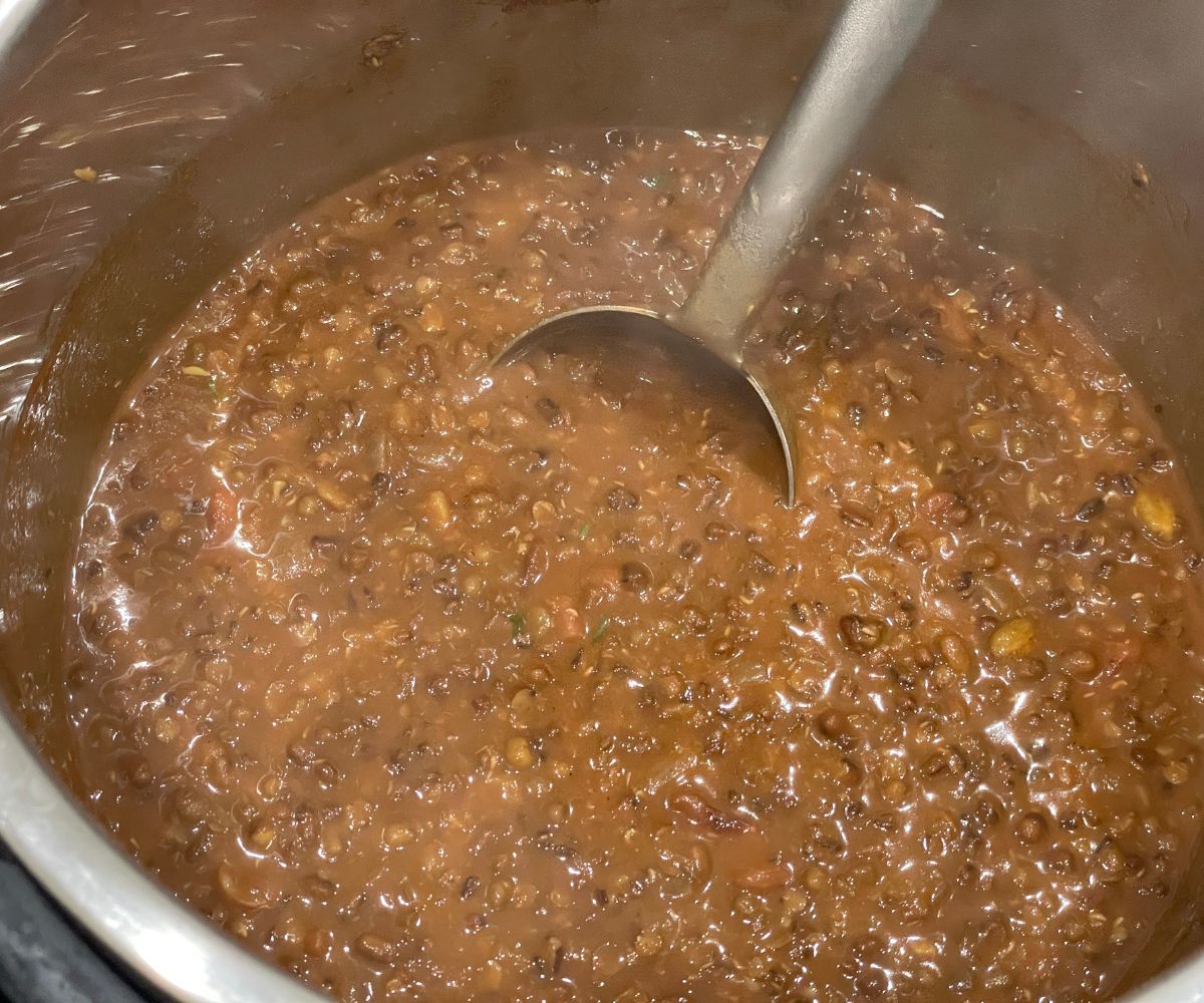 An instant pot has dal makhani curry.