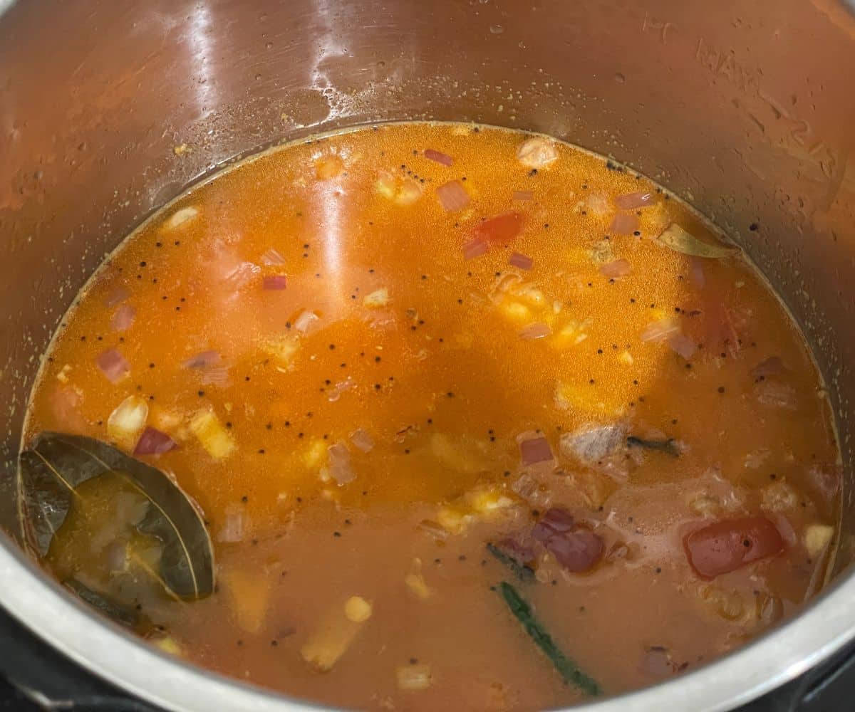 A pot has gajarati dal mixture.