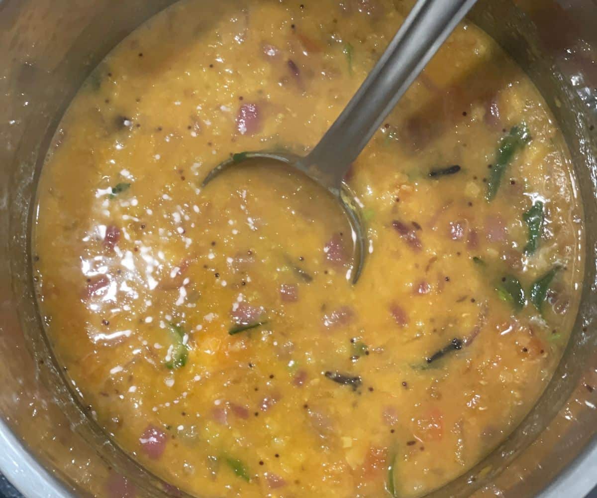 An instant pot has Gujarati dal.