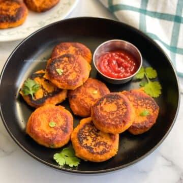 A plate full of sweet potato cutlets.