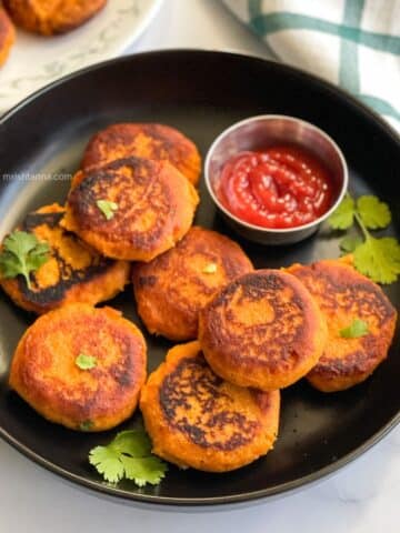 A plate full of sweet potato cutlets.