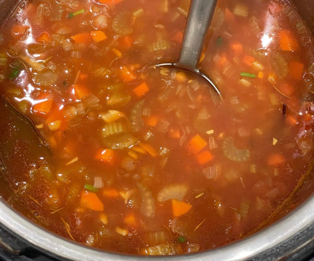 An instant pot has Garbanzo bean soup.