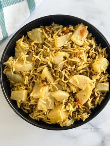 A bowl of radish pulao is on the table.