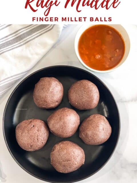 A plate of ragi mudde is on the table.