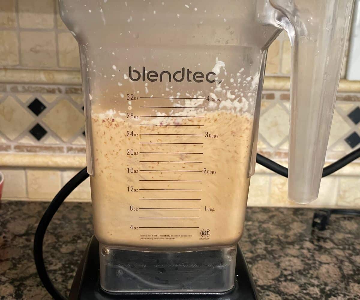 A blender is with Sambar paste.